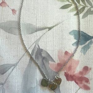 Brighton silver charm necklace.